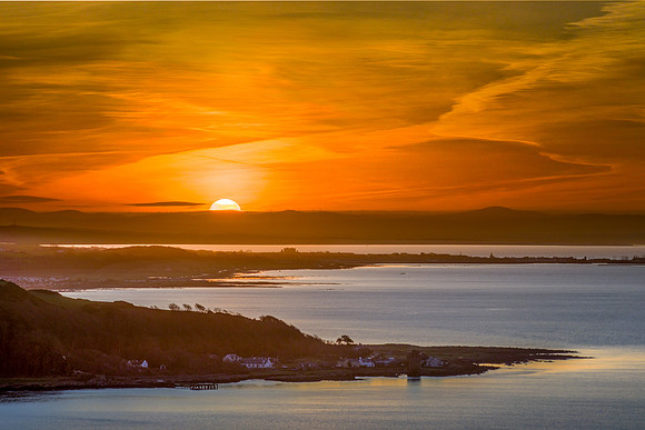 This is the sunrise over Portencross, with Ardrossan behind and then Troon beyond.