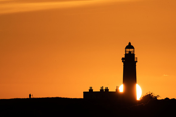 The photographer and the setting sun, It would appearer I was not the only one photographing Turnberry LighthouseI decided to take a different approach photograph the Lighthouse form a distance with a