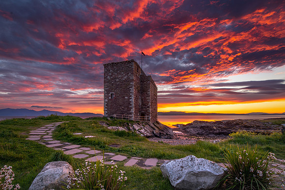 Fire in the sky at Portencross Castle